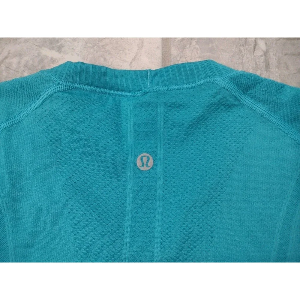 LULULEMON Women's EUC Swiftly Tech short-sleeve teal green top - size 10